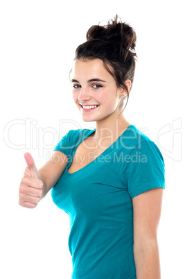 Gorgeous pretty girl showing thumbs up to you