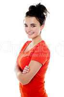 Confident girl posing with folded arms