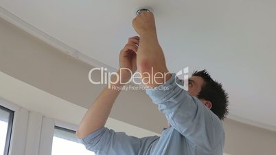 Man repairing lights