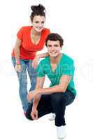 Trendy girl posing with her boyfriend