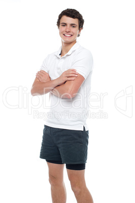 Cute guy posing with crossed arms