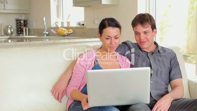 Couple on video chat on laptop