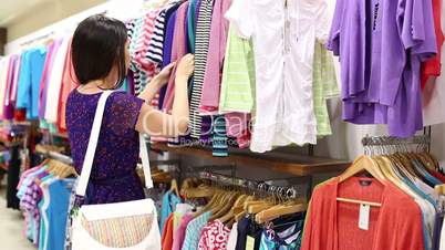 Woman looking through clothes