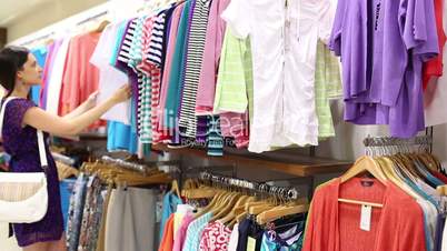 Woman looking through clothes