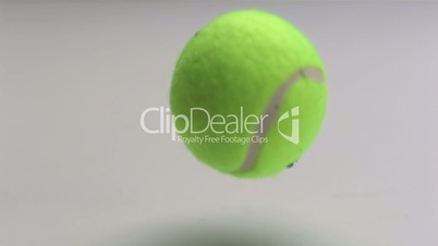 Tennis ball falling