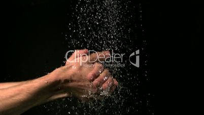 Hands washing under water