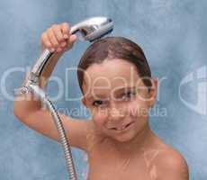 Little boy is bathed in the shower