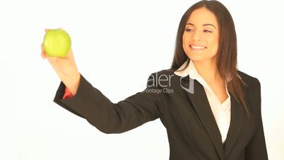Attractive businesswoman with an apple