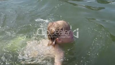 Child learns to swim