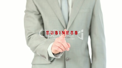 Businessman pressing the business button