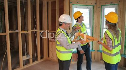 Architects planning the construction of the house