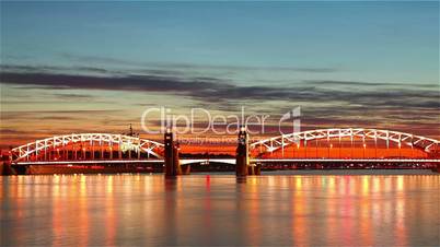 Bridge over Neva river in St.Petersburg at evening. Timelapse