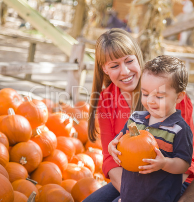 Happy Mixed Race Family at the Pumpkin Patch