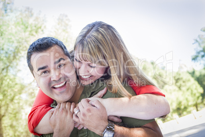 Attractive Mixed Race Couple Piggyback at the Park
