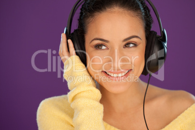 Smiling woman enjoying her music