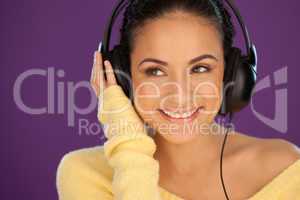 Smiling woman enjoying her music
