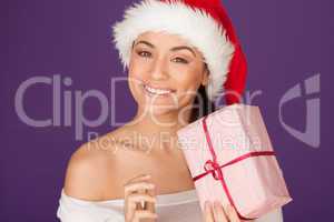 Beautiful woman with Christmas gift