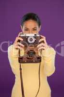 Woman with vintage film camera