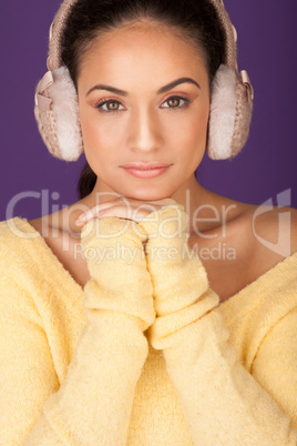 Stylish woman in winter ear muffs