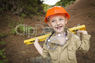 Adorable Child Boy with Level Playing Handyman Outside