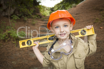 Adorable Child Boy with Level Playing Handyman Outside