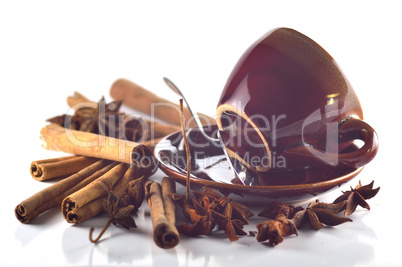 Cinnamon, anise, with a coffee cup
