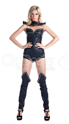 Sexy blond woman in leather corset stand isolated