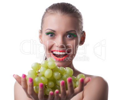 funny young woman offer green grapes isolated