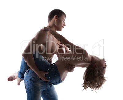 Sexy couple posing topless in jeans silhouette