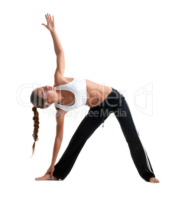 Beauty young girl posing yoga in fitness costume