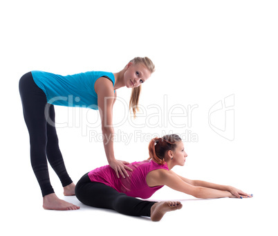 fitness instructor help woman doing stretch