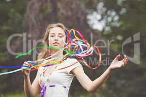 Beautiful girl with ribbons