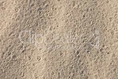 Tracks of rain on sand