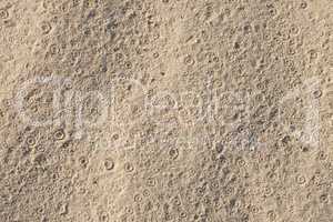 Tracks of rain on sand
