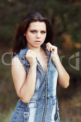 Beautiful Girl on a pine-wood