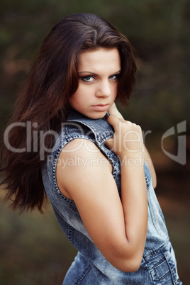 Beautiful Girl on a pine-wood