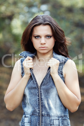 Beautiful Girl on a pine-wood