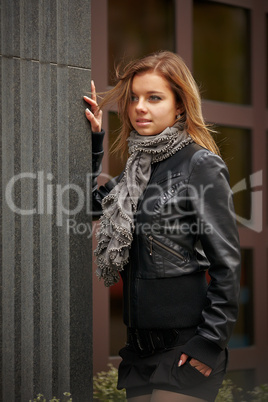 Beautiful girl in autumn coat