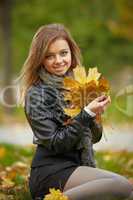 Beautiful girl in the autumn park