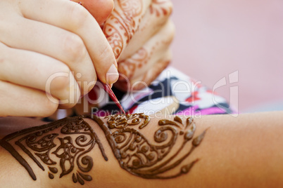 Henna art on woman's hand