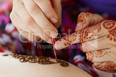 Henna art on woman's hand