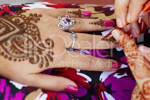 Henna art on woman's hand