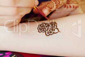 Henna art on woman's hand