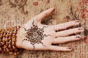 Henna art on woman's hand