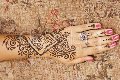 Henna art on woman's hand