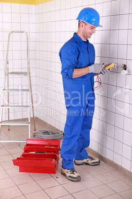 Man preparing voltmeter