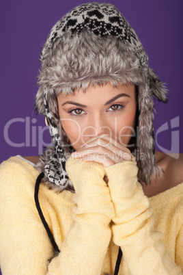Attractive woman in furry winter hat