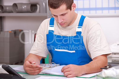Artisan doing paperwork