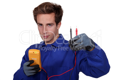 an electrician using an ammeter