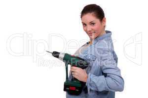 Woman holding an electric screwdriver